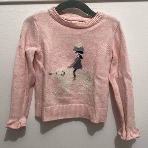Gap size 5 girls pink sweater with an image of a girl riding a polar bear. EUC